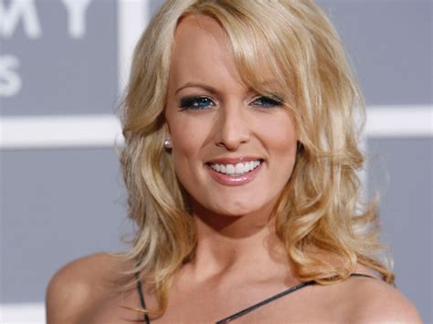 Stormy Daniels shows her patriotic pride (and tattoos) in bikini